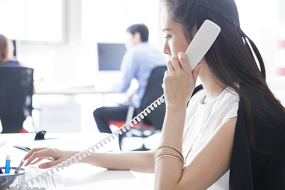Office worker speaking on the phone